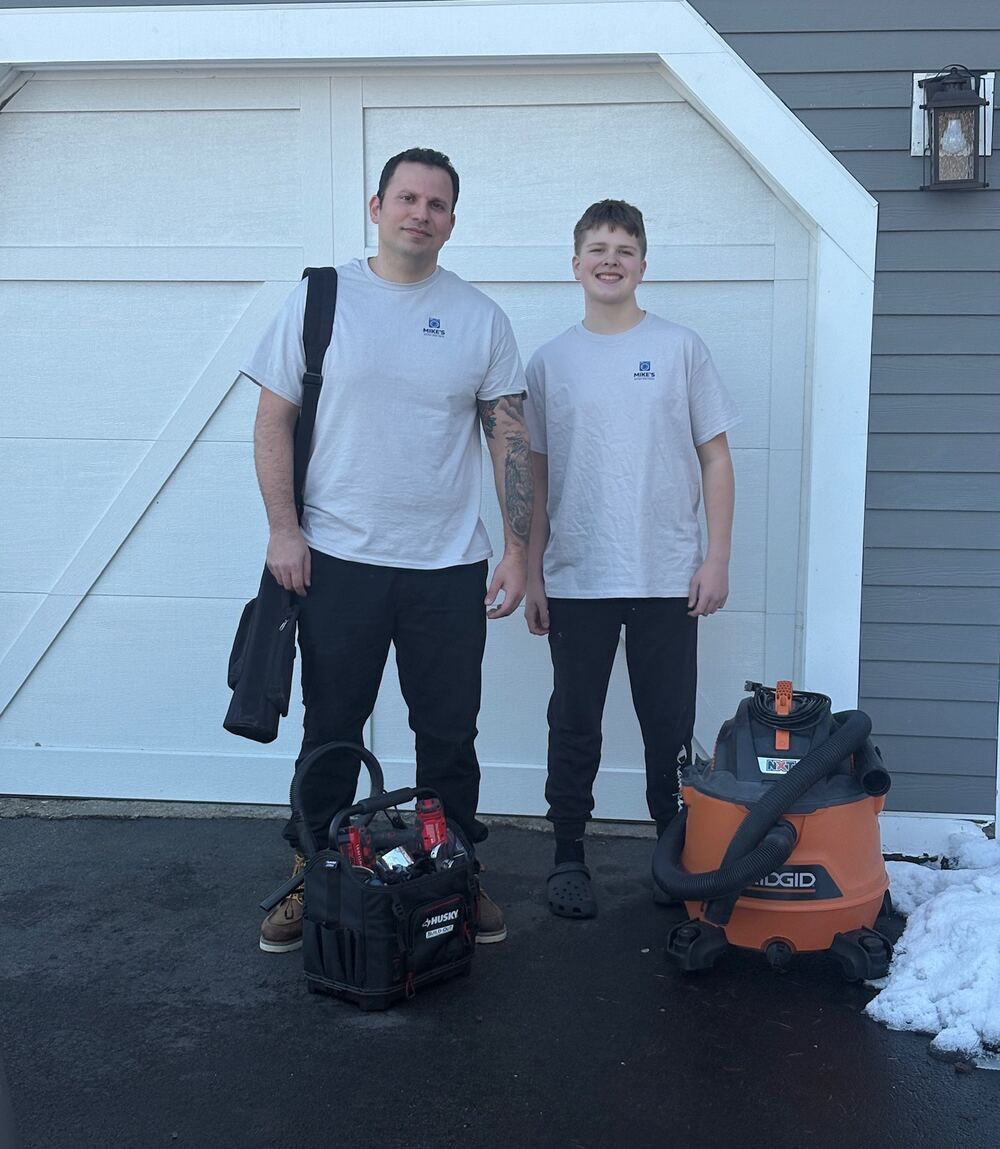 Mike's Dryer Vent Pros team with equipment