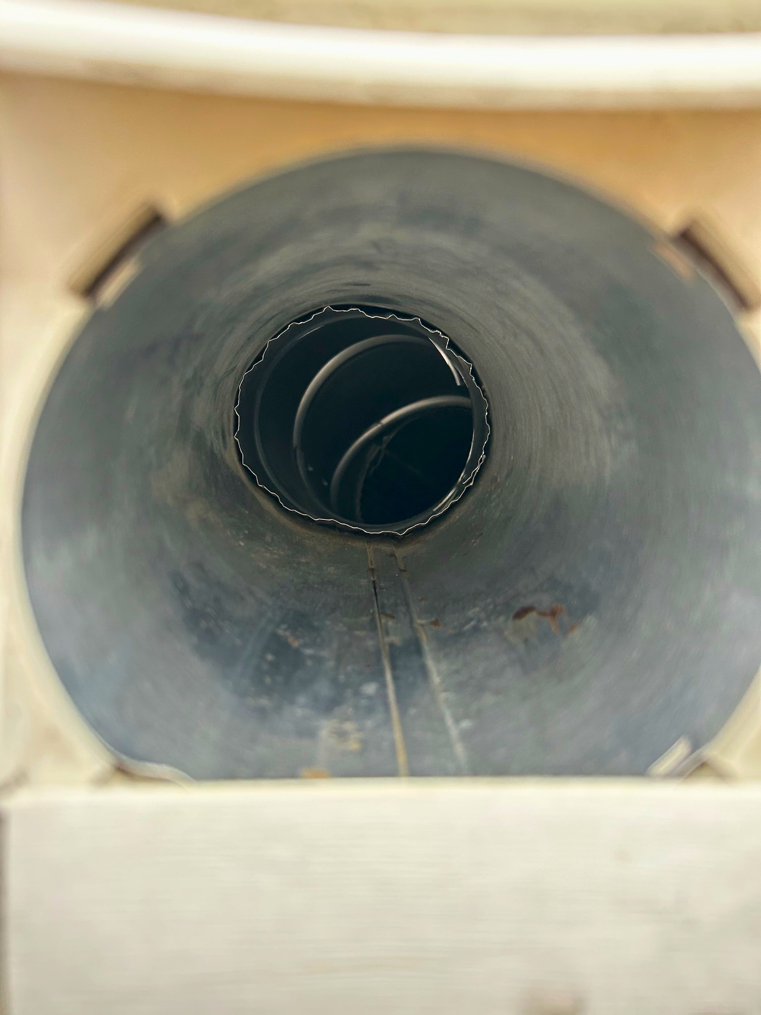 Clean round dryer duct after service