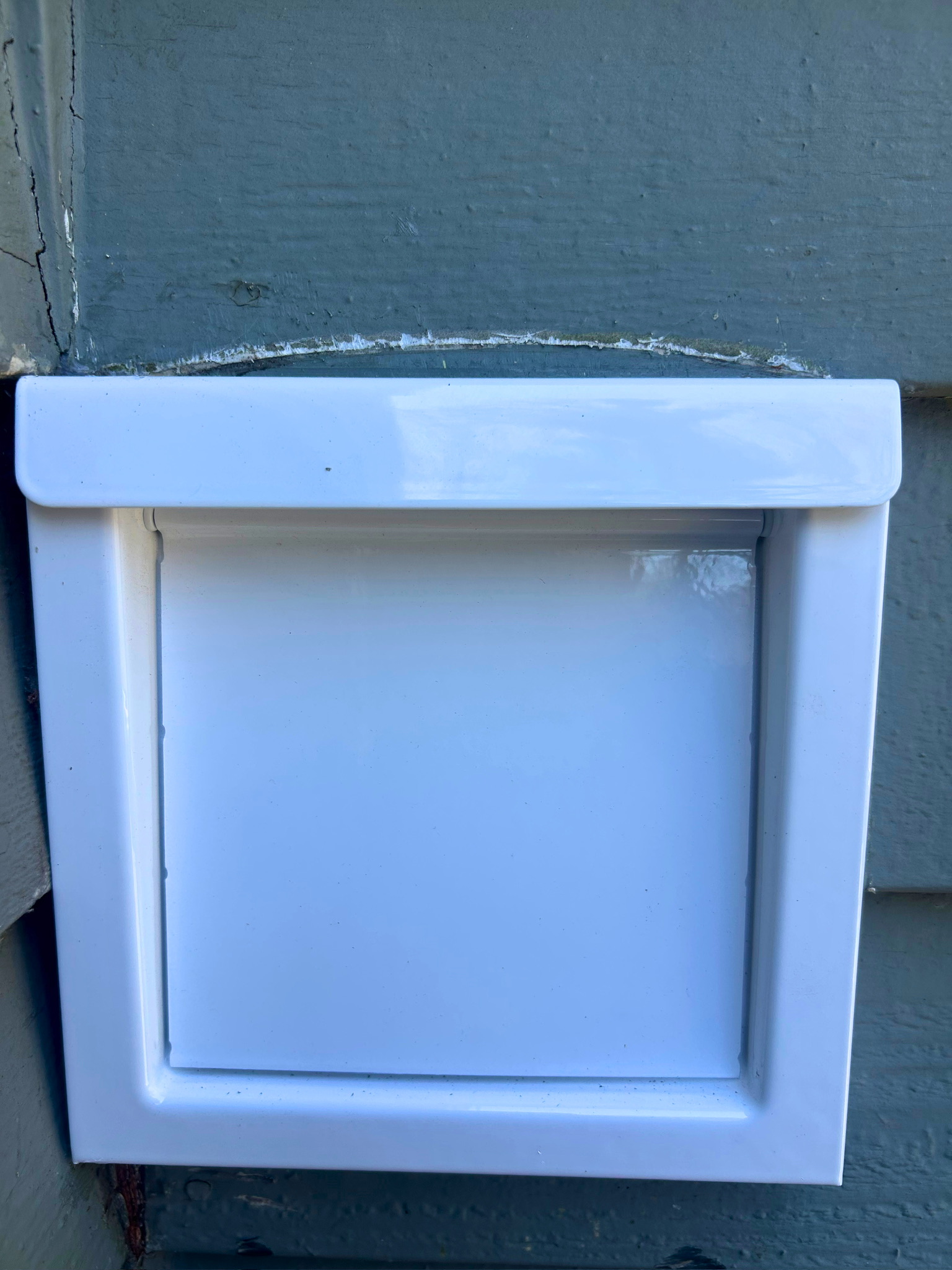 Newly installed exterior dryer vent cover
